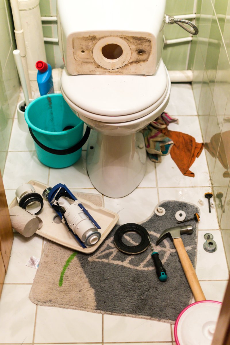 New toilet being installed in a Brentford bathroom
